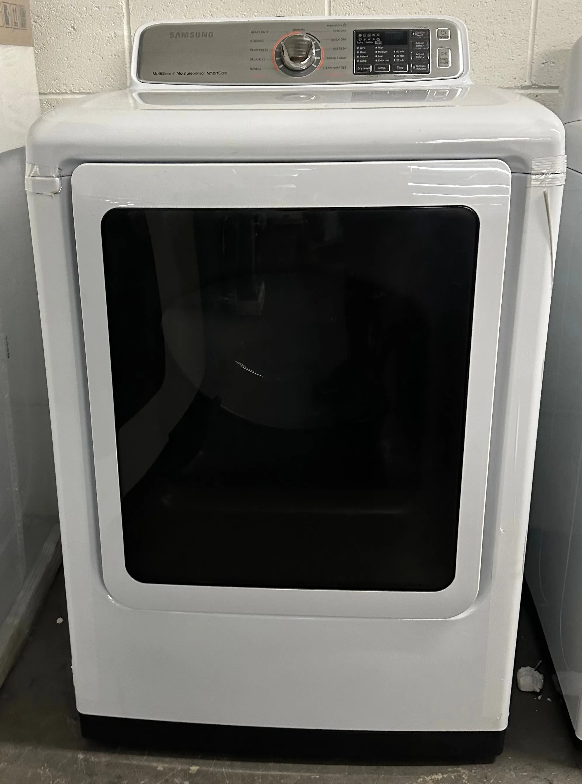 Samsung DVE50M7450W 27 Inch Electric Dryer with Multi-Steam™, Wrinkle Prevent Option, Sensor Dry, 11 Dry Cycles, Smart Care, 4-Way Venting, Eco Dry, Reversible Door and 7.4 cu. ft. Capacity